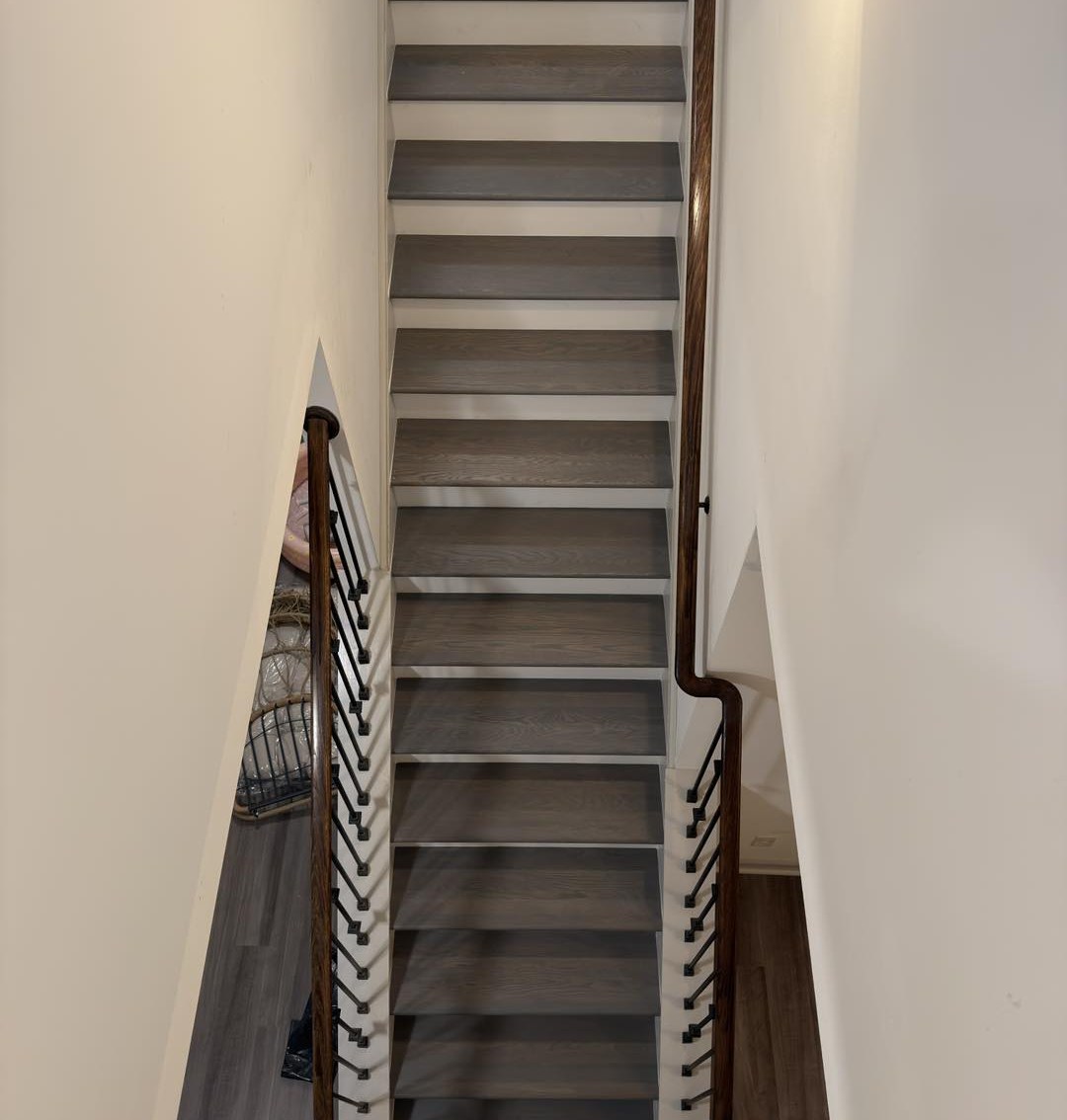 After: living room with light gray wood-look flooring